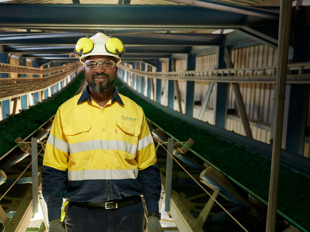 Mining professional working inside a processing facility