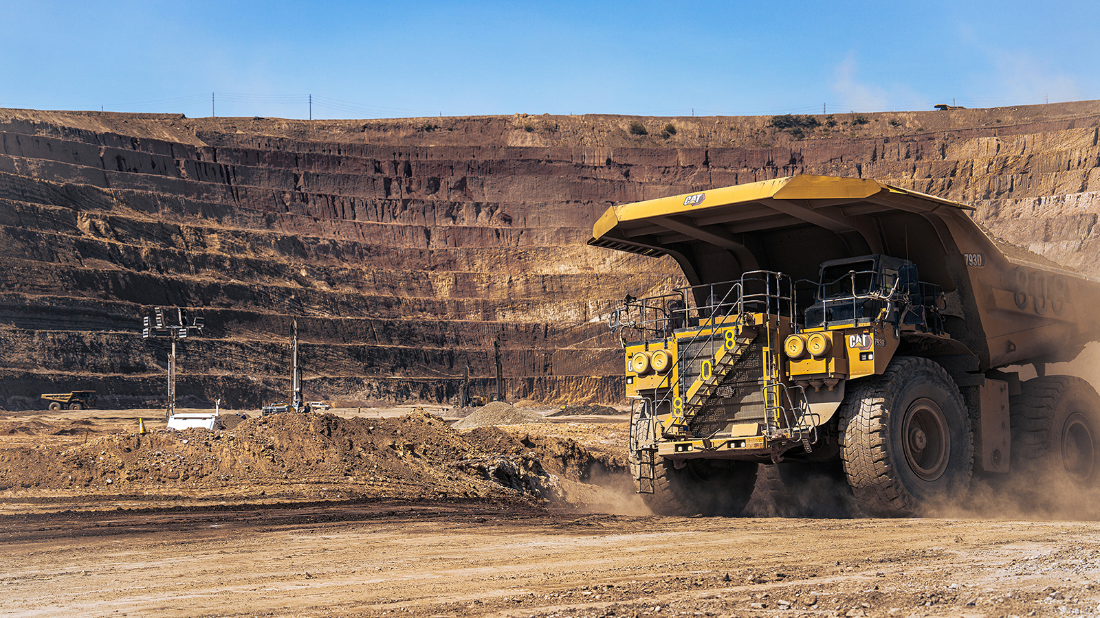 Large haul truck operating in an open-pit mine